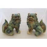 Pair of large unmarked, Chinese ceramic Dogs of fo 22 x 23cm