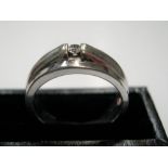 Modernist 9ct white gold ring with small solitaire diamond Approx 6.5 grams gross size R