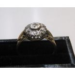 18ct gold with platinum setting, circular diamond set cluster ring Approx 3.8 grams gross size N