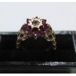 Modernist 9ct yellow gold ruby cluster ring with unusual circular shoulders Approx 3.2 grams