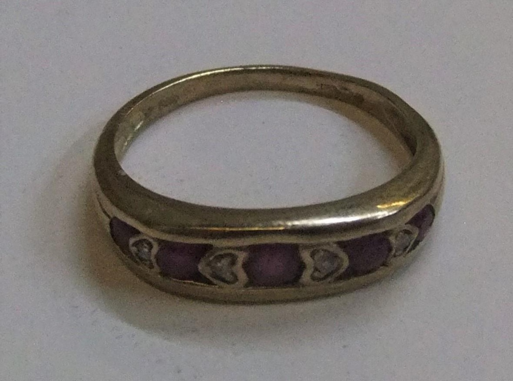9ct yellow gold ring with round cut rubies interspersed with diamonds approx 2.3 grams gross, size N - Image 3 of 3