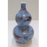 Chinese double gourd blue vase with impressed marks to base 22 cm high