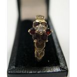 9ct yellow gold ruby flower ring Approx 1.2 grams gross size N