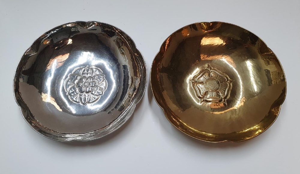 2 circular metal bowls, both with matching English rose motifs and stamped Keswick KSIA, Both