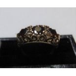 9ct yellow gold 3 stone garnet ring Approx 3.9 grams gross, size K/L