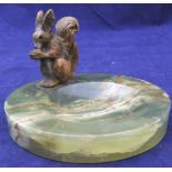 Early 20thC oynx ashtray with cold painted, bronze squirrel