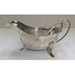 Antique silver sauce boat with matching spoon, 135 grams
