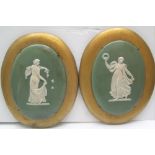 Pair of large Wedgewood cameos on oval gilt painted wood bases, 20 x 17 cm