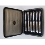 Cased set of Antique British silver handled knives
