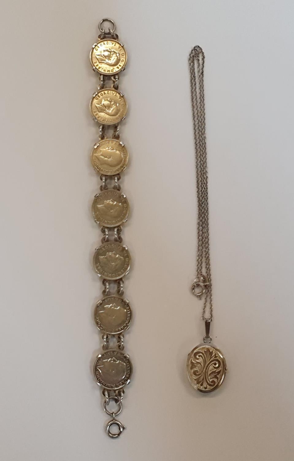 2 silver items to include a silver George V & VI coin bracelets and a silver locket & chain.