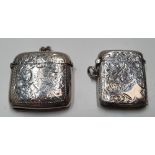 2 - Early 20thC hallmarked silver vesta cases, both heavily engraved, Total combined weight approx