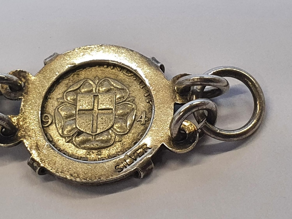 2 silver items to include a silver George V & VI coin bracelets and a silver locket & chain. - Image 6 of 6