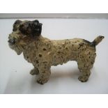Antique, unmarked cold-painted bronze of a Terrier dog, circa 1910, 11 cm long by 7 cm high