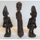 Pair of 1970s Nigerian wood carved fertility (twins) carvings and another wood carving of a male, Th