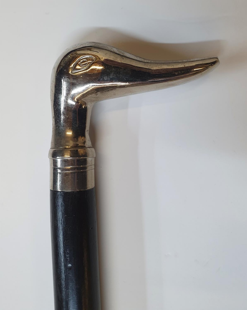 Ebonised wood walking stick with ducks head, unmarked white metal handle, 93 cm in length - Image 3 of 3