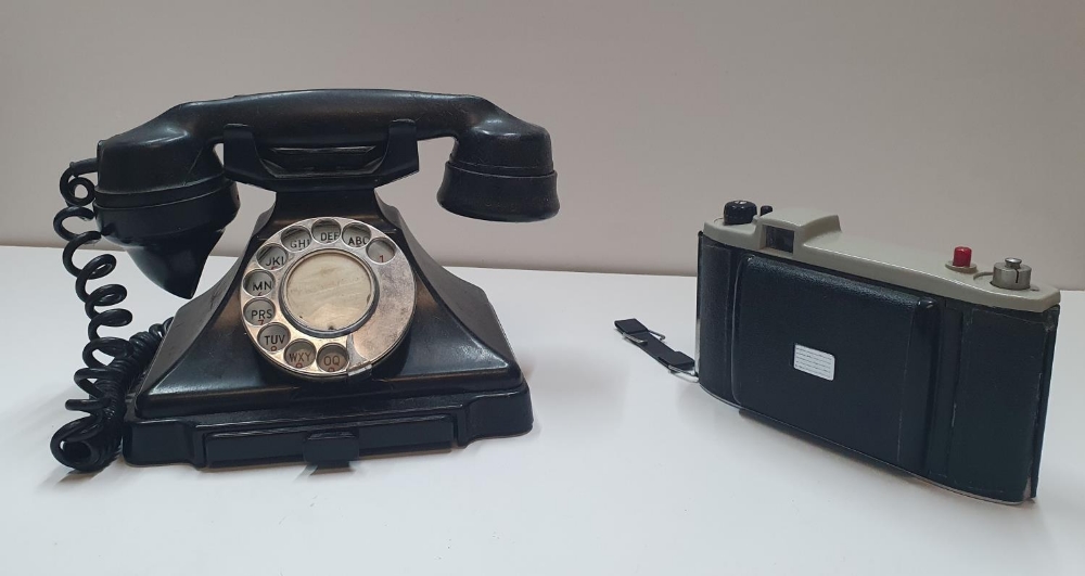 Vintage Bakerlite telephone and a Kodak "sterling II" camera