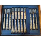 Cased set of 6 silver handled knives & forks in hardwood box, 1 knife missing