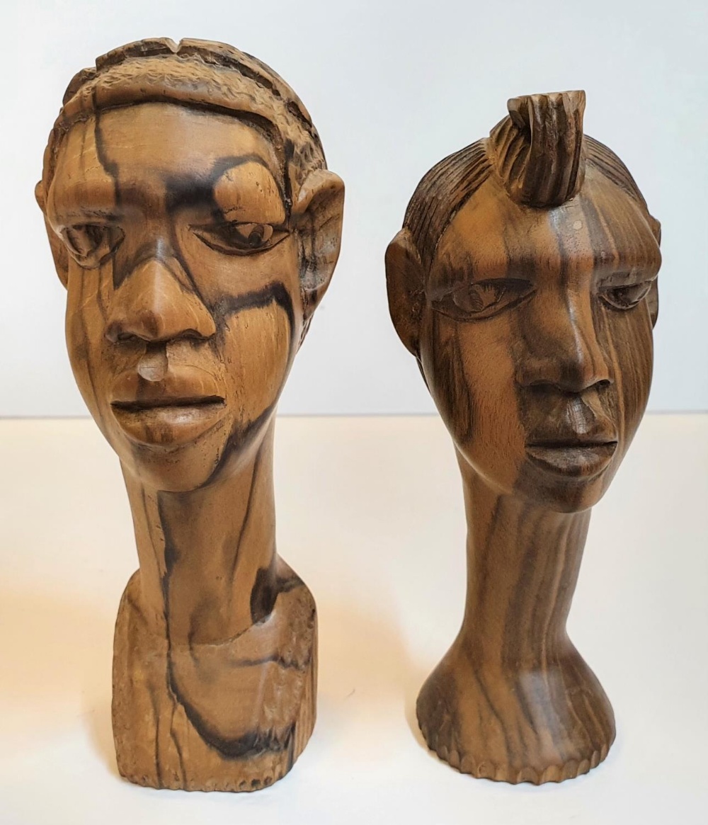 Pair of Nigerian wood carvings and a large ebony wood head carving lamp (no wiring), The pair