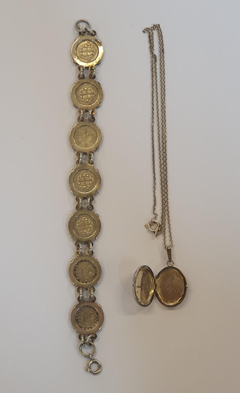 2 silver items to include a silver George V & VI coin bracelets and a silver locket & chain. - Image 2 of 6