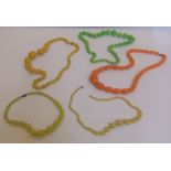 Quantity of vintage (1970s & 80s) colourful bead necklaces