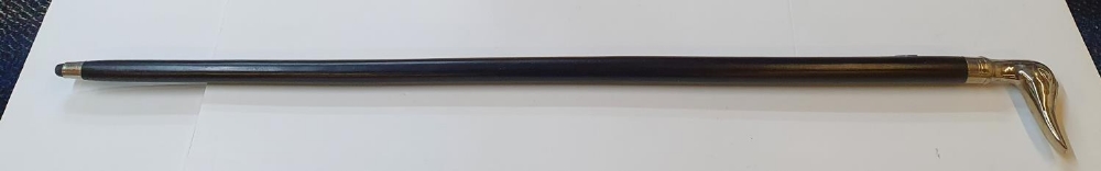 Ebonised wood walking stick with ducks head, unmarked white metal handle, 93 cm in length