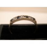 9ct yellow gold, half eternity ring with alternating diamonds & blue sapphire Approx 1.3 grams
