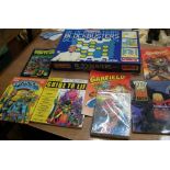 Blockbusters boardgame by Waddingtons and 7 comic books including Garfield etc
