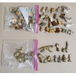 2 bags of small collectables to include Wade Whimsies & similar and some small brass figures (Qty)