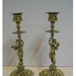 Pair of decrative brass candlesticks (20 cm high) in an 18thC style