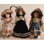 3 Windsor collection porcelain decorative large dolls in Victorian dress, all on metal stands,