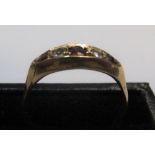 18ct yellow gold boat shaped ring with rubies & diamonds Approx 2.7 grams gross, size O/P