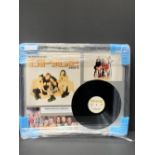 Spice Girls - Framed Photo signed by Geri Halliwell, Victoria Beckham & Mel C. With unsigned album