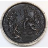 Antique bronze circular wall relief plaque in marble surround with foundry stamp verso The plaque