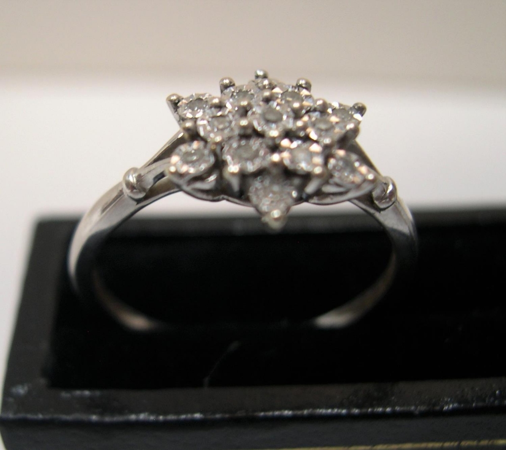 9ct white gold, diamond cluster ring Approx 2.1 grams gross, size O