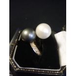 18ct yellow gold diamond set crossover pearl sporting a south seas black & white pearl