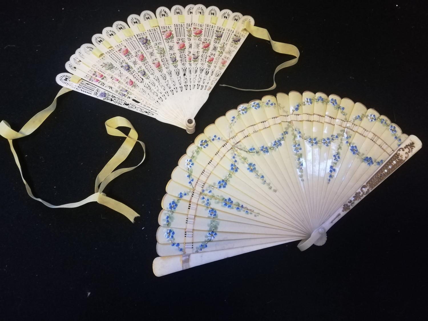 2 hand decorated fans