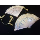 2 hand decorated fans