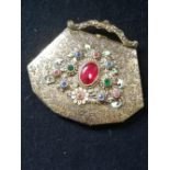 Compact in the form of a handbag with enamelled flowers and paste decoration 3¼" x 3"