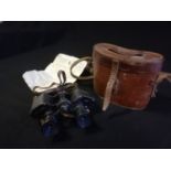 Pair of Negretti & Zambra field glasses / binoculars in original leather case & with receipt