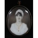 Portrait miniature of a lady on ivory in a locket frame with hair to back & initials DAE