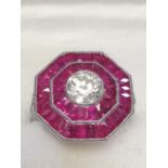 Fine quality octagonal shaped platinum ruby & diamond dress ring set with a central old cut diamond