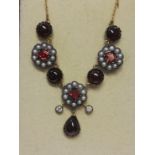 Necklace (18") set with cabochon garnets, square cut garnets, seed pearls & diamonds