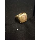 Mens brass signet ring with head decoration