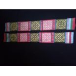 Pair of Asian textile sashes -23" x 3"