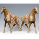 Large pair of Tang dynasty painted pottery horses with saddles (618-907AD) -22" x 20"