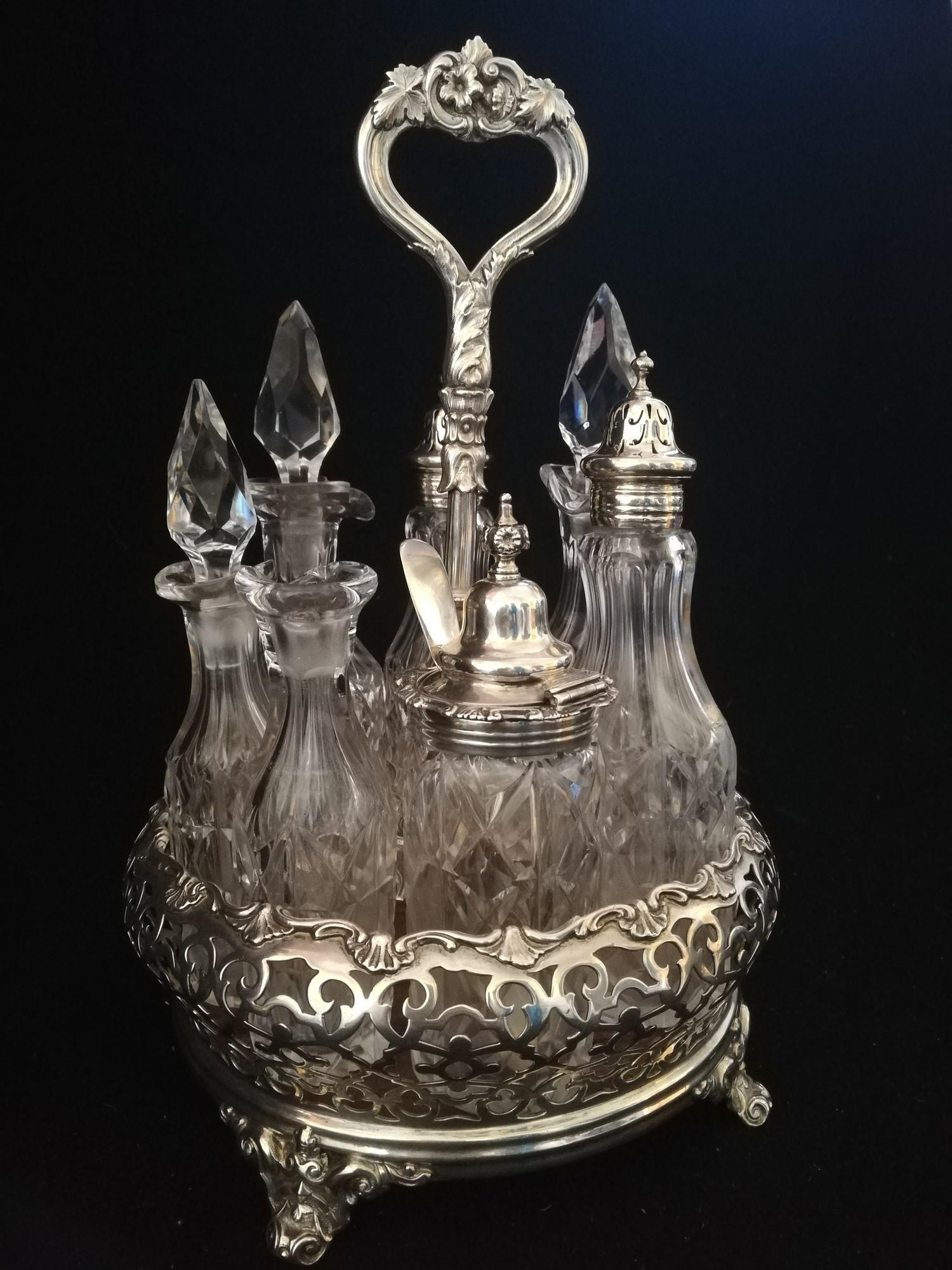 Victorian (1864) silver & glass 7 bottle cruet stand (1 stopper missing) by William Evans