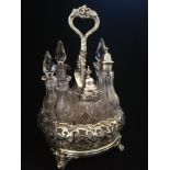 Victorian (1864) silver & glass 7 bottle cruet stand (1 stopper missing) by William Evans