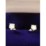 Pair of diamond stud earrings 0.7ct