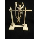 Cantonese carved ivory toy with pair of acrobats