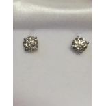 Pair 18ct white gold diamond studs -approx diamond weight 1.41ct